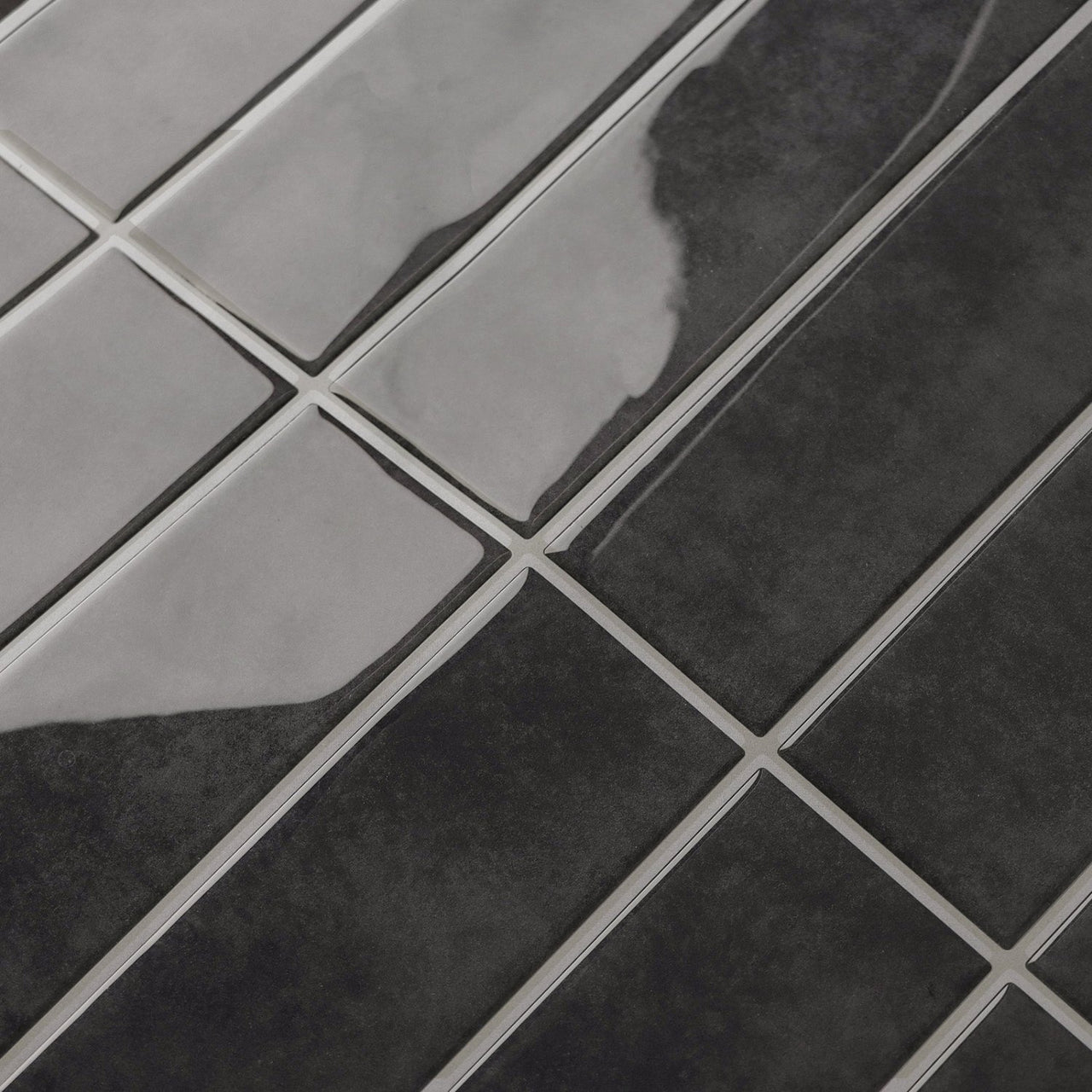 Self-adhesive 3D tiles in dark grey stacked subway design