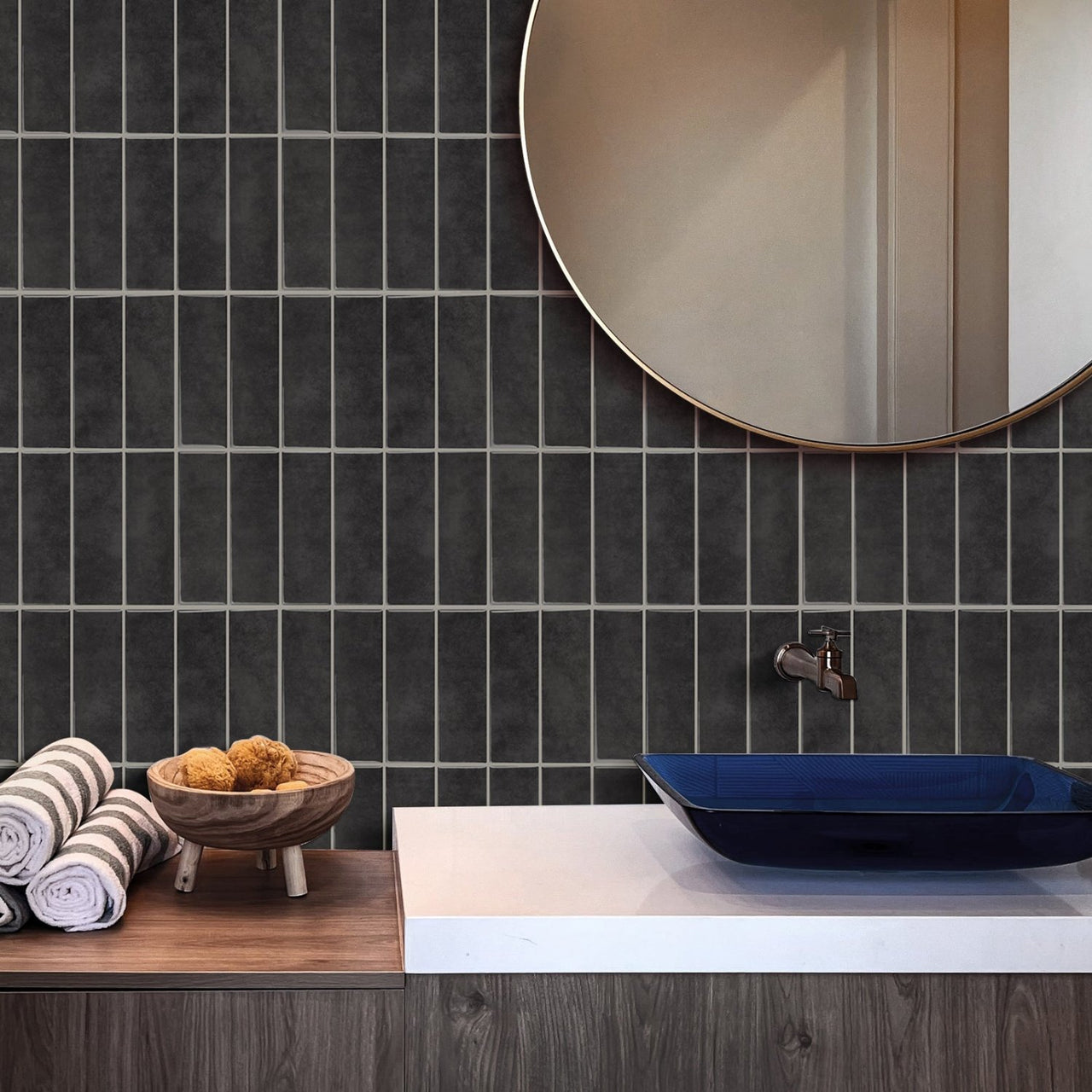 Dark grey stacked subway tiles in bathroom