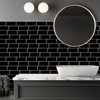 Thumbnail for black subway tile in bathroom