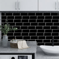 Thumbnail for Black peel and stick subway tile in laundry room