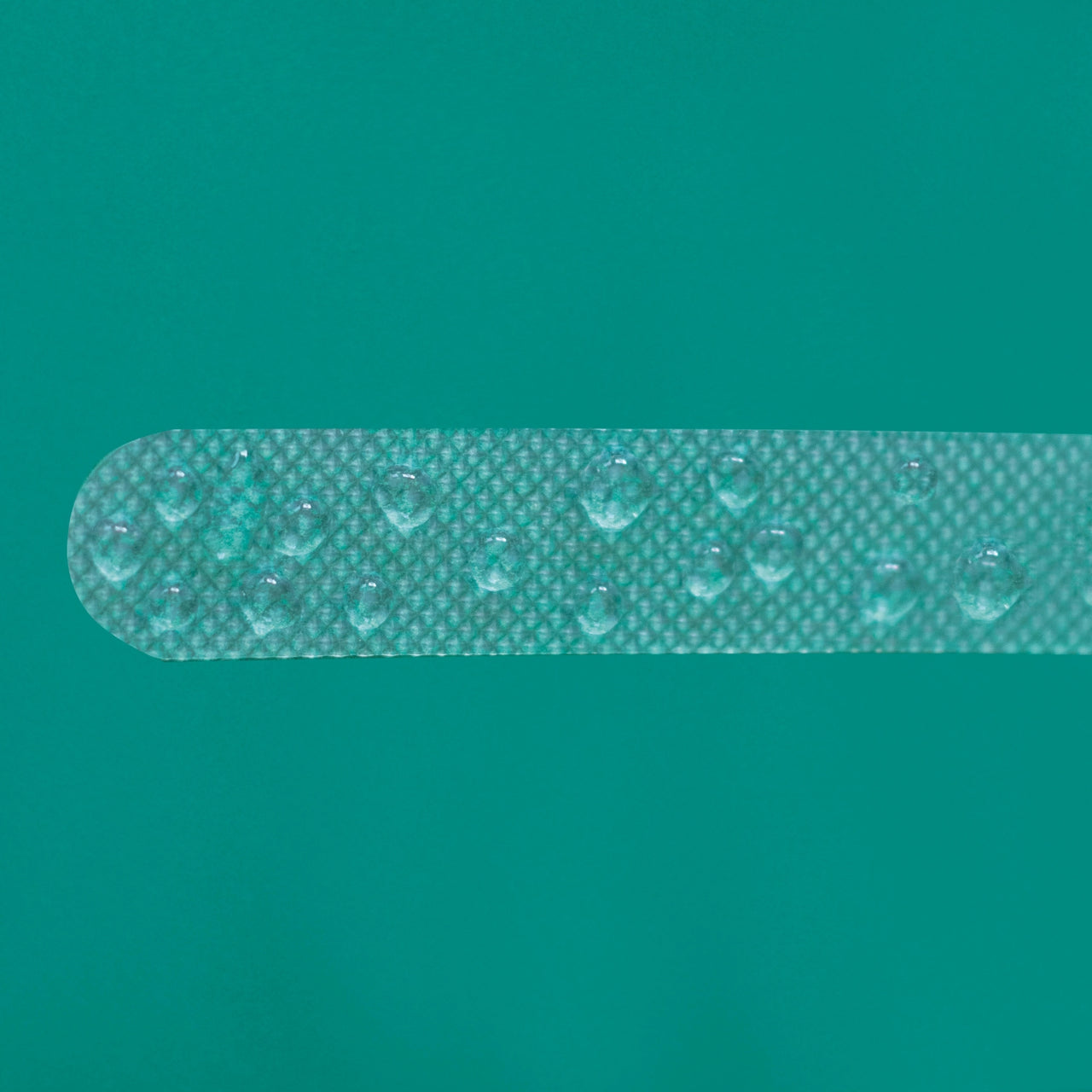 Clear strips anti slip grip with water droplets showing it's waterproof
