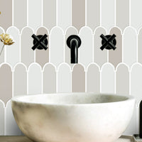 Thumbnail for Grey feather wall tiles with white grout above bathroom sink