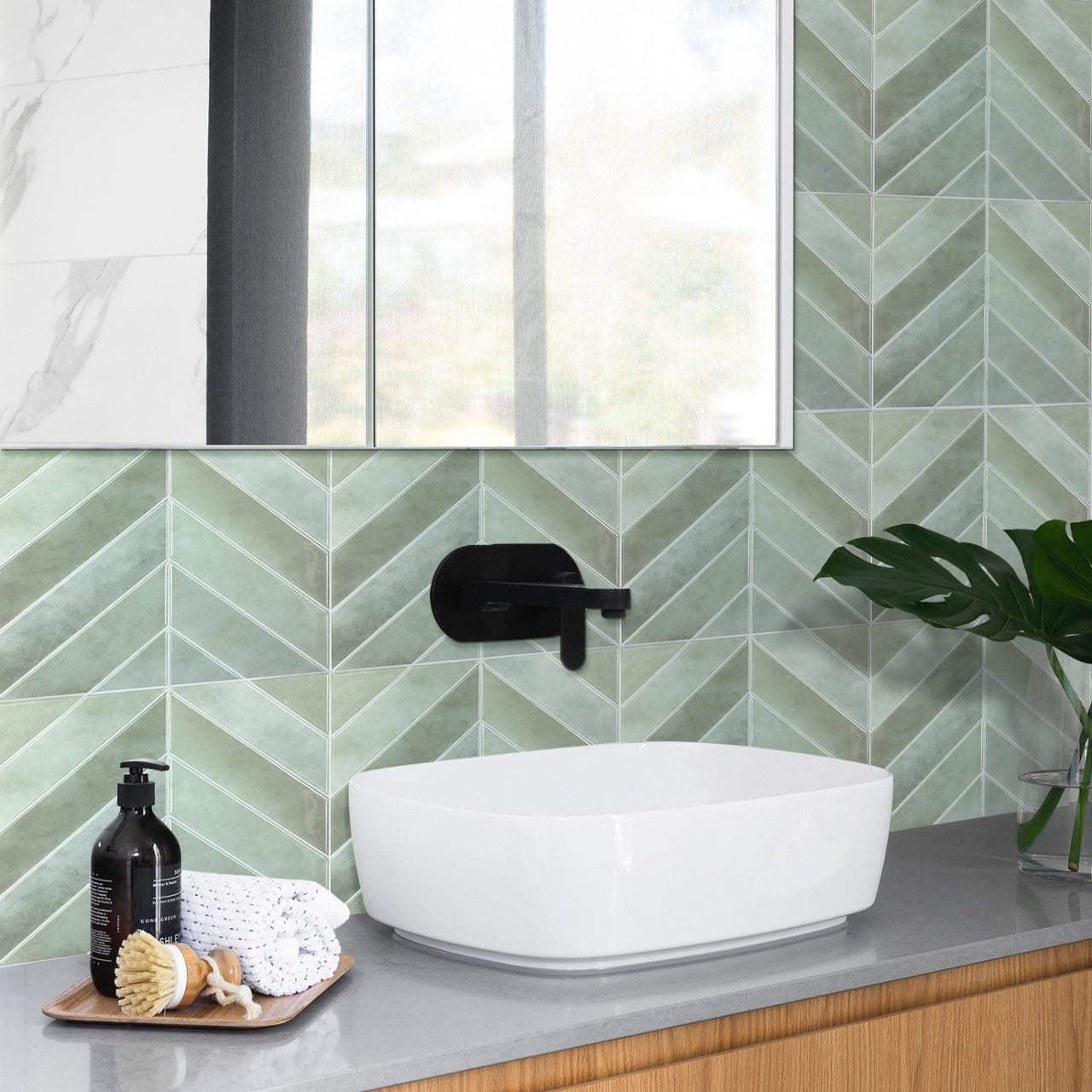 green chevron peel and stick tile in bathroom