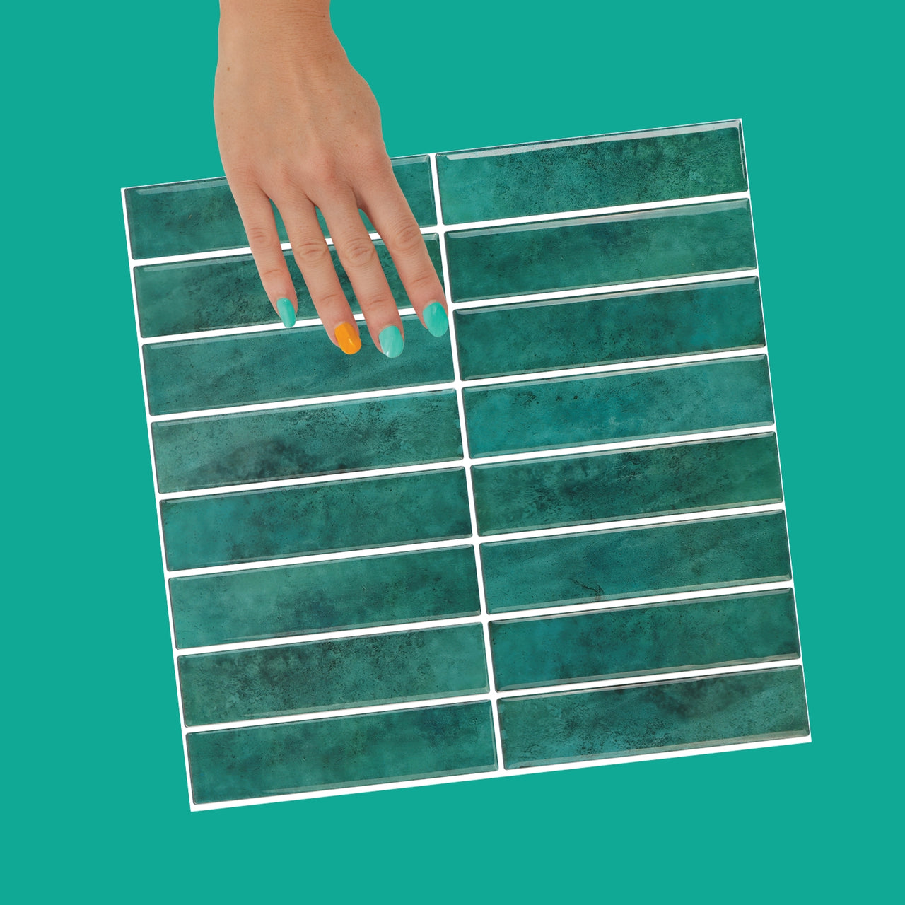 Green kit kat tile with white grout that is peel and stick