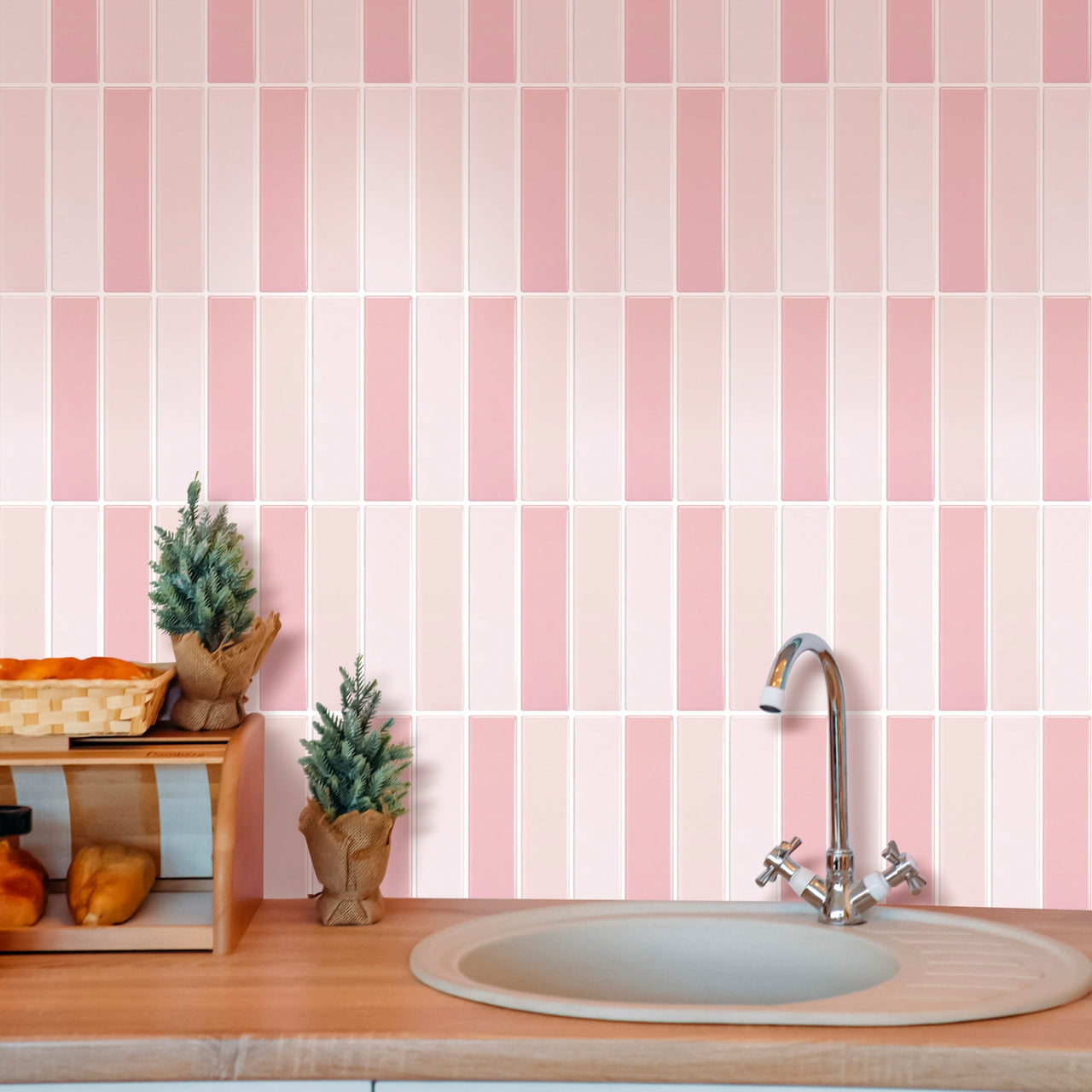 Pink peel and stick kit kat tiles as kitchen splash back