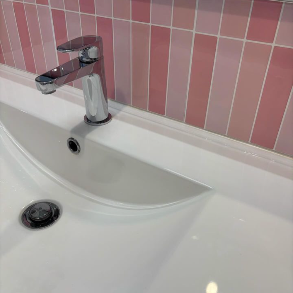 Pink kit kat tiles over vanity