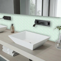 Thumbnail for Mint green herringbone tiles over bathroom vanity
