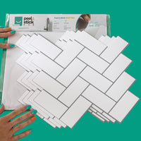 Thumbnail for Packaging of white herringbone tiles