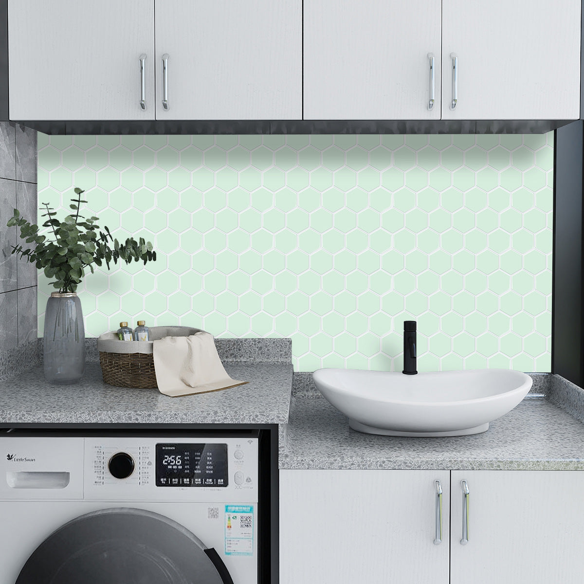 Laundry with mint green hexagon tiles