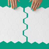 Thumbnail for Two white hexagon peel and stick tiles being connected