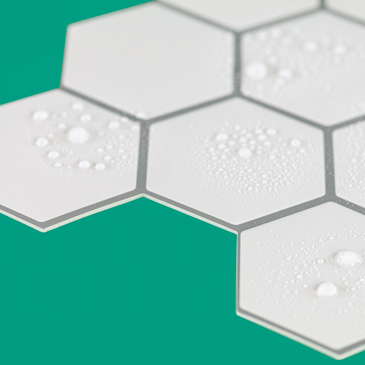 White hexagon peel and stick tiles are waterproof