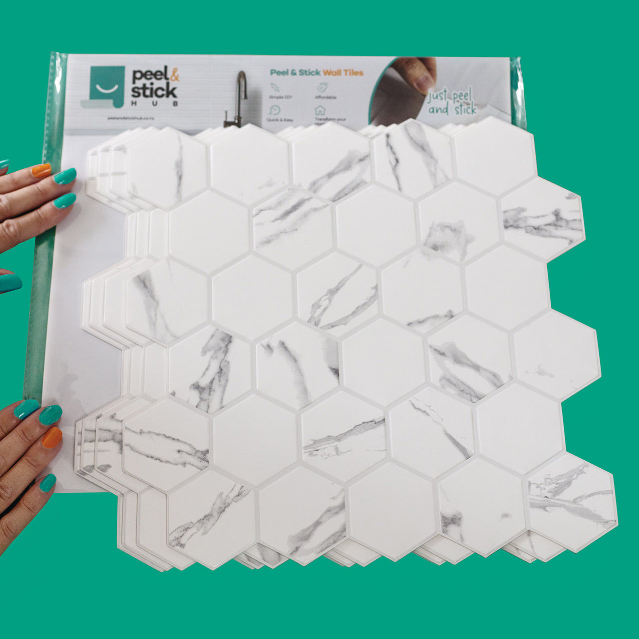 4-pack of marble hexagon peel and stick wall tiles