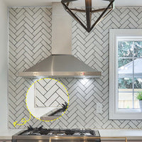 Thumbnail for Silver edge trim around herringbone white tiles