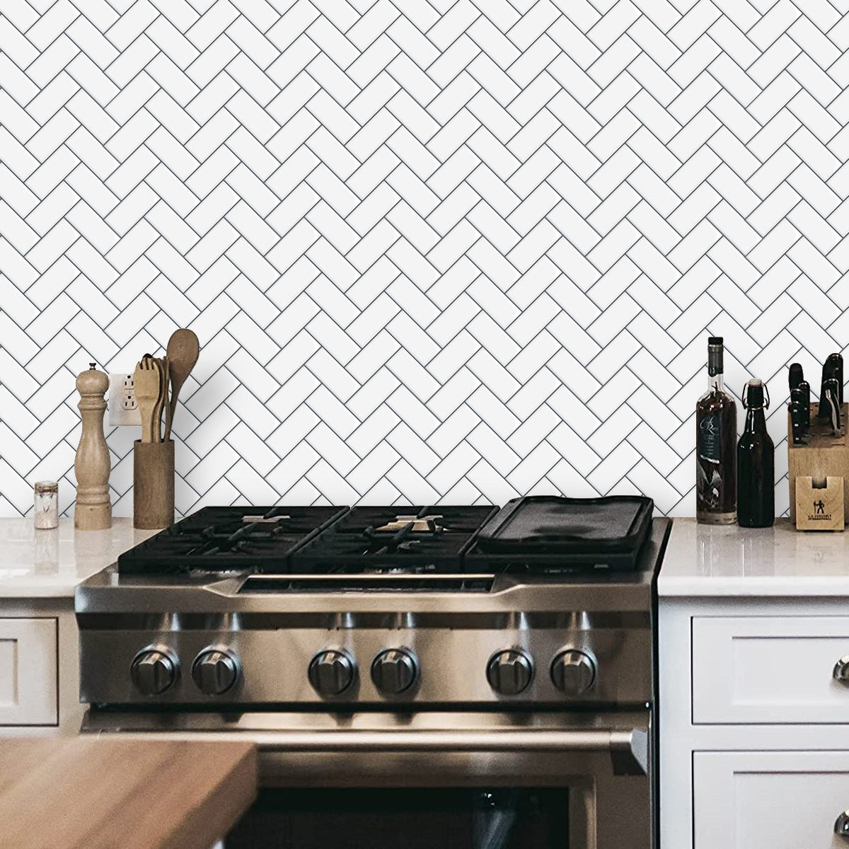 Kitchen splash back of white herringbone tiles