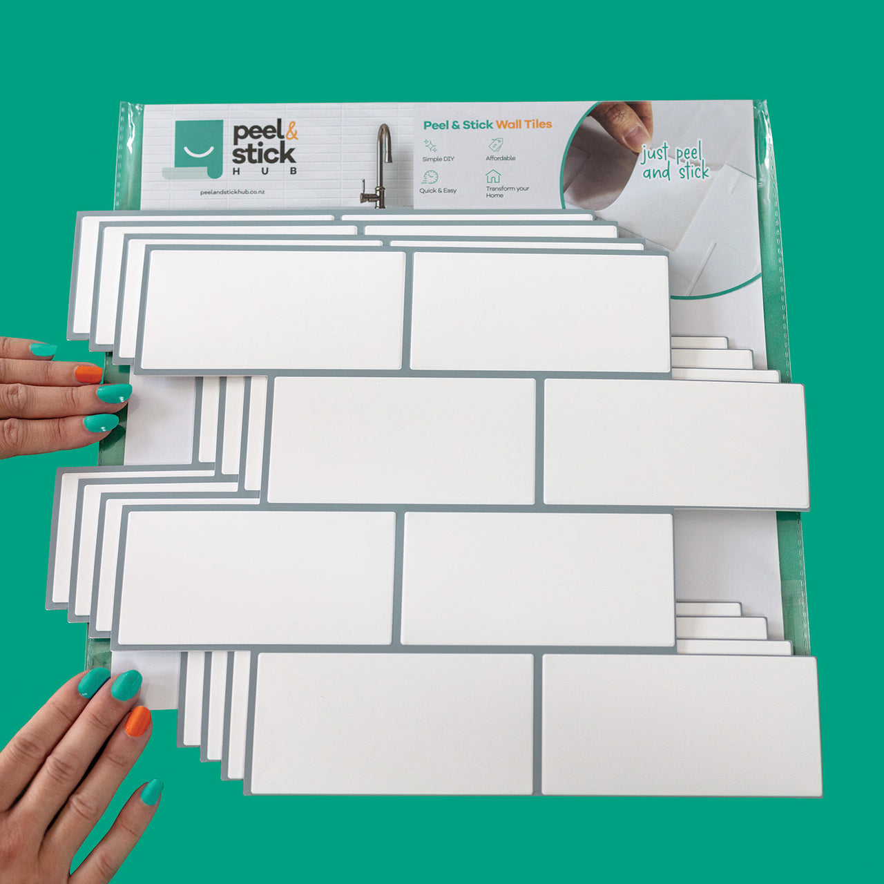4-pack of white subway tiles with grey grout